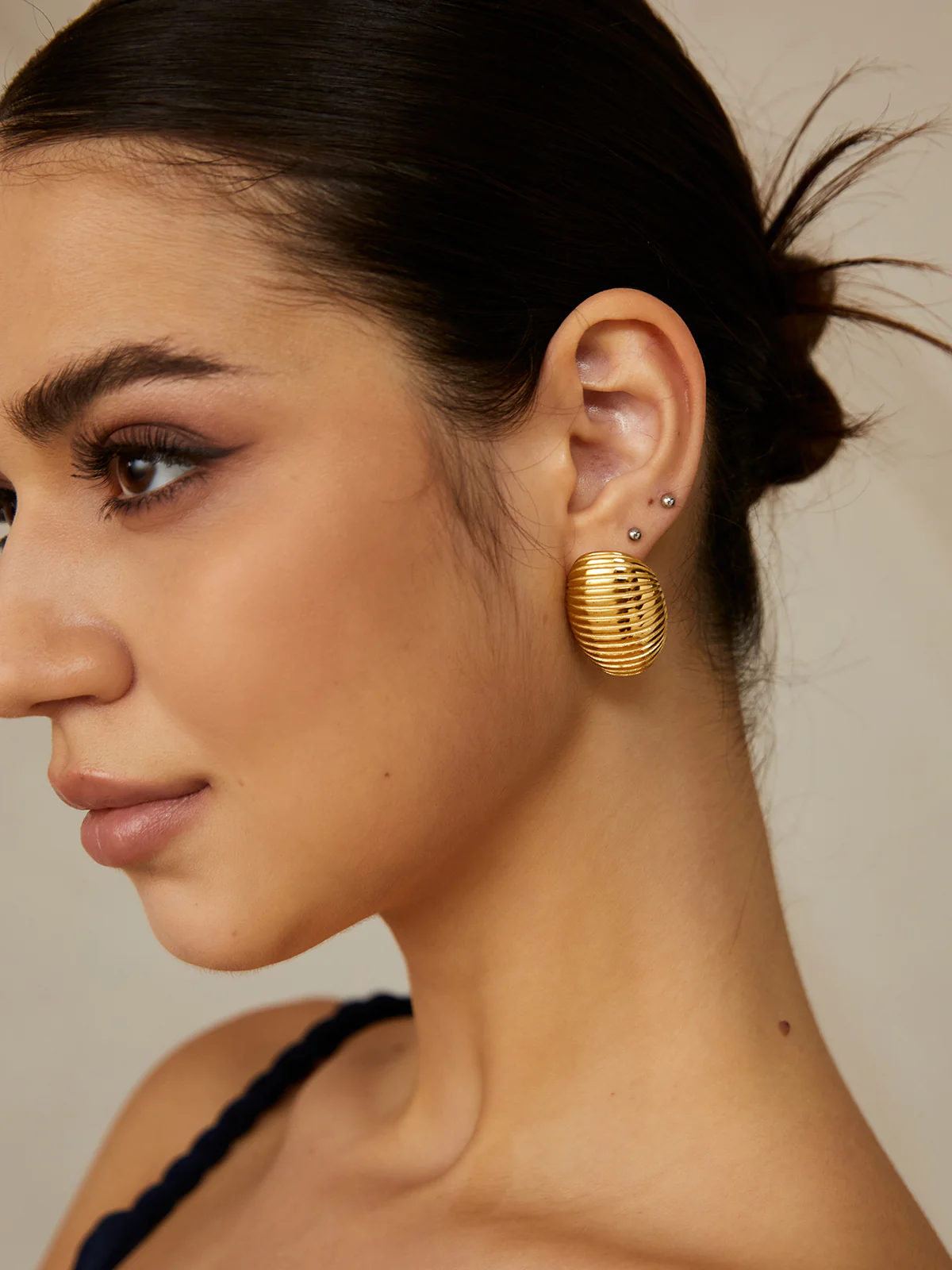 Golden Ribbed Half-Hoop Earrings - Image 4