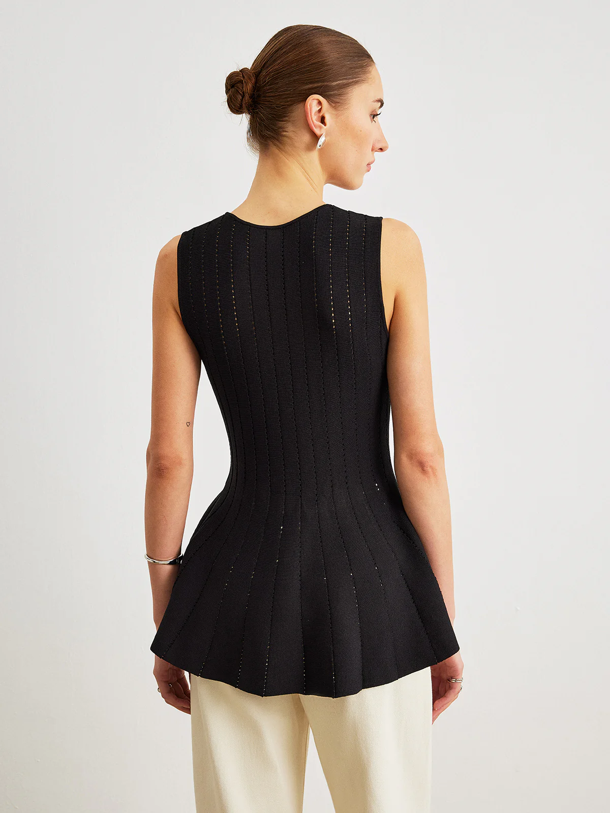 Semi-Sheer Knit Peplum Top With Bow Detail - Image 6